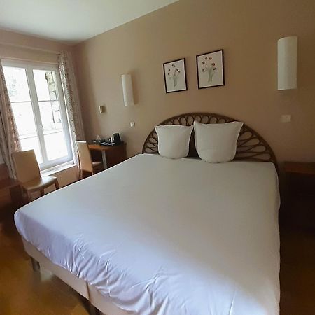 Hostellerie Du Lys Lamorlaye Bagian luar foto